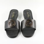 Black Leather Flat Slide Sandal with Gold Accent
